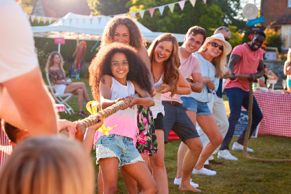School carnival with inflatables on a campus field